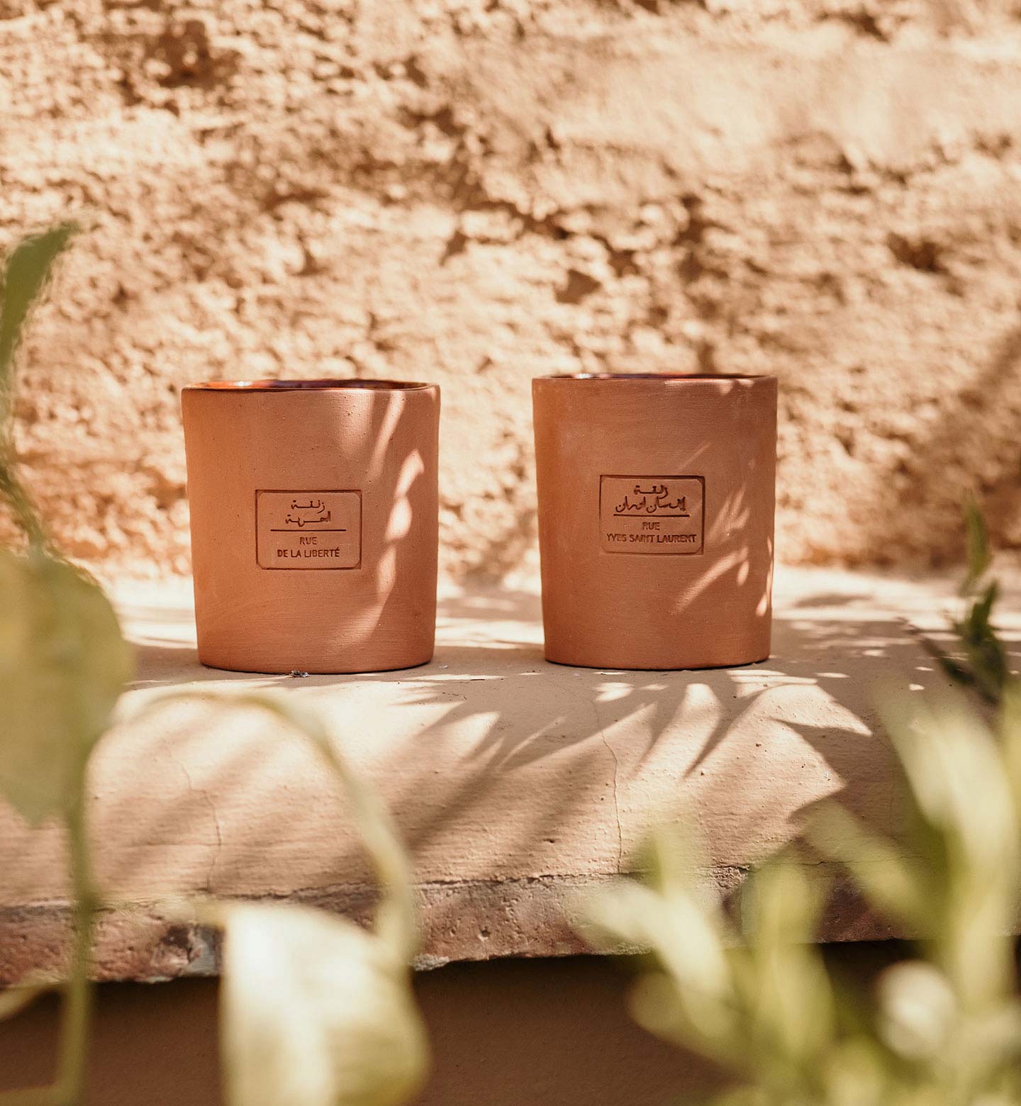 deux bougies de la collection 40000 marrakech en couleur de terre cuite